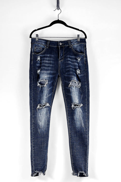 Ausgefranste, ausgefranste Skinny Jeans